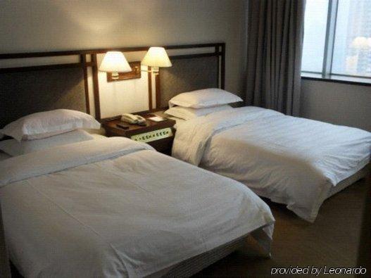 Celeste Palace International Hotel Jiangmen Room photo
